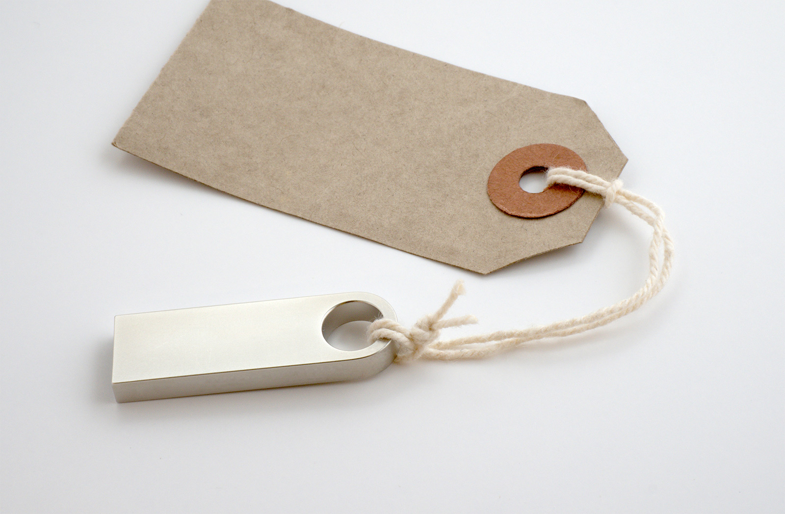 usb drive attached to a paper tag