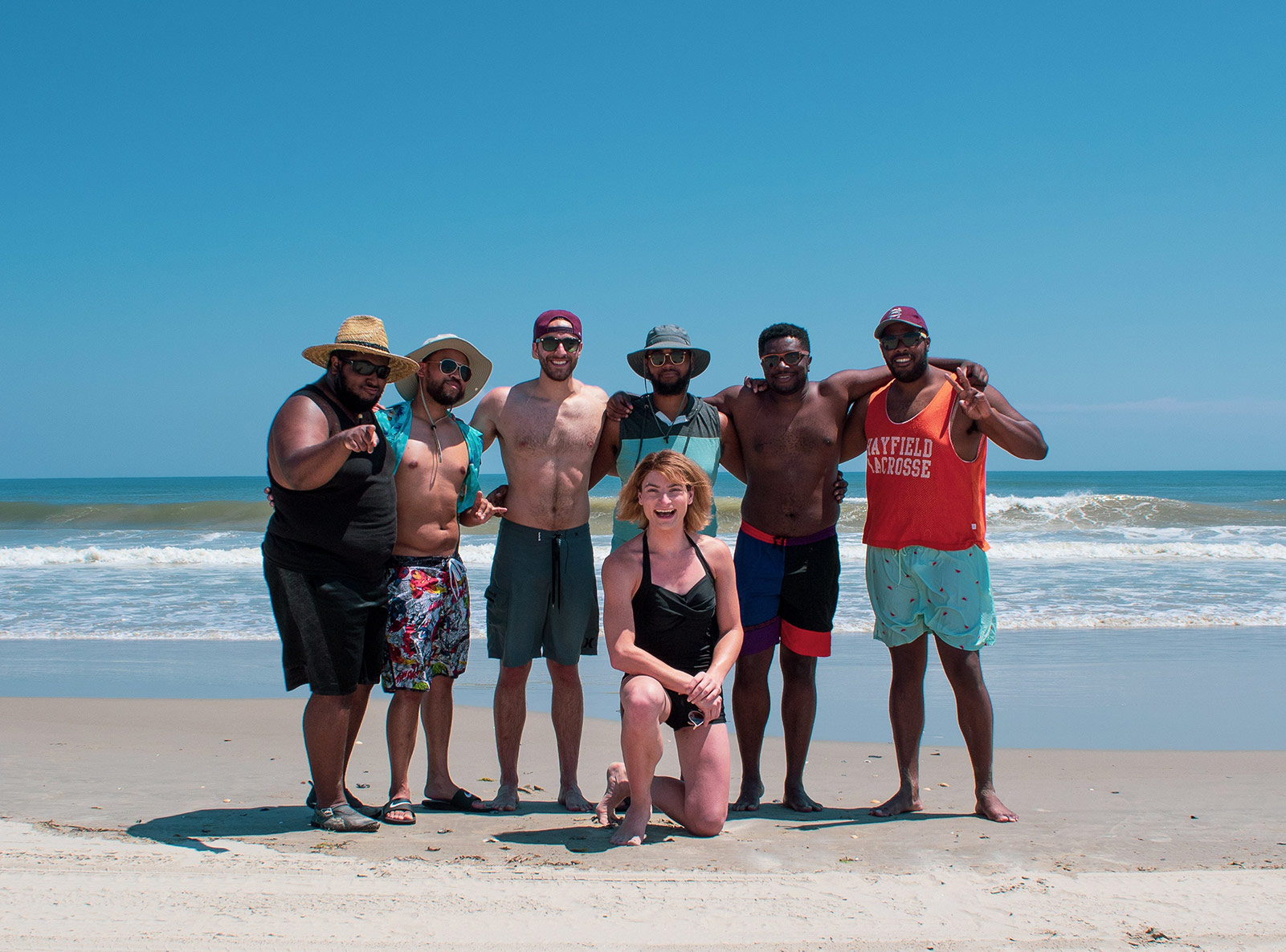 group of diverse people on a beach