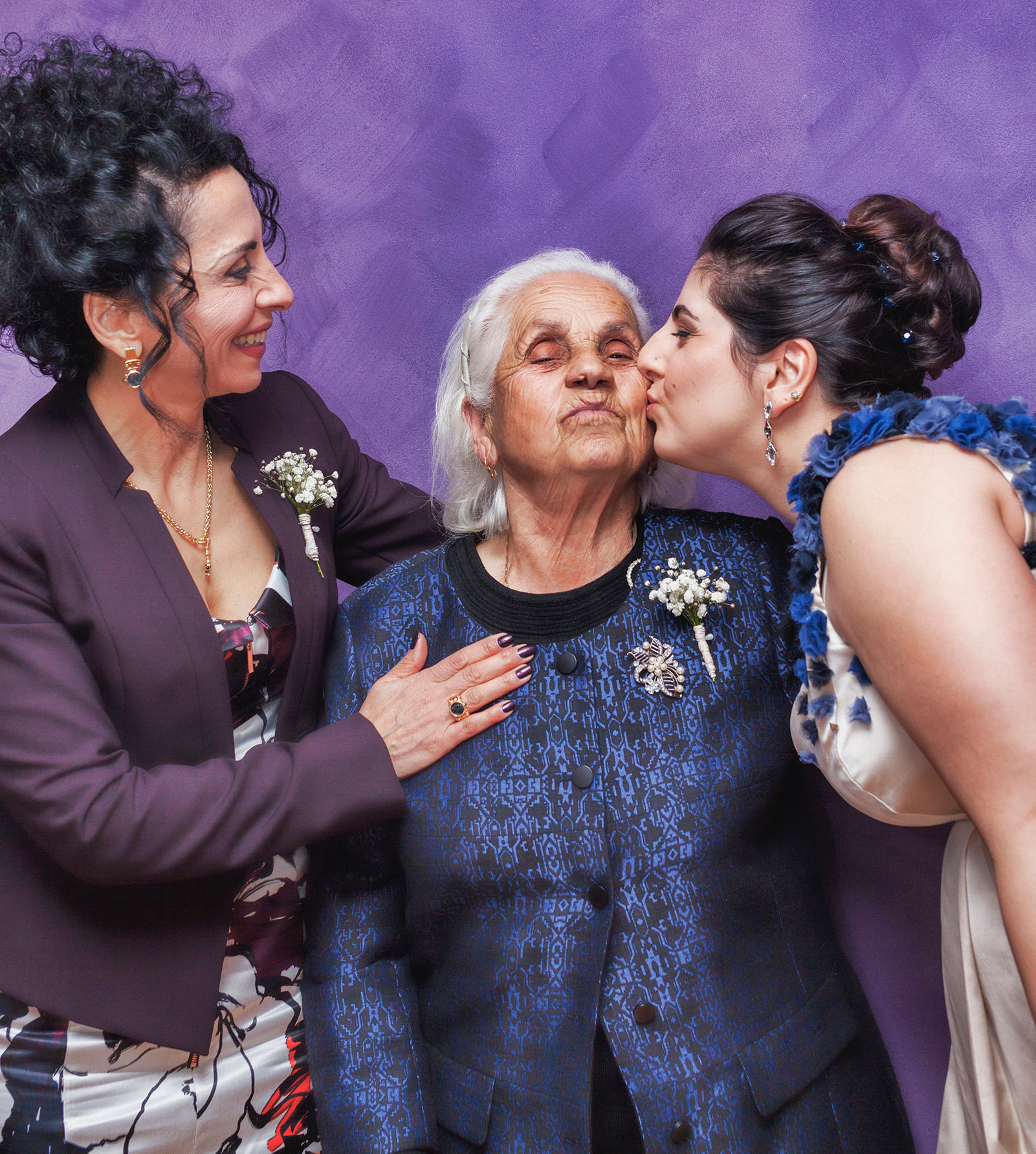 woman kissing grandmother