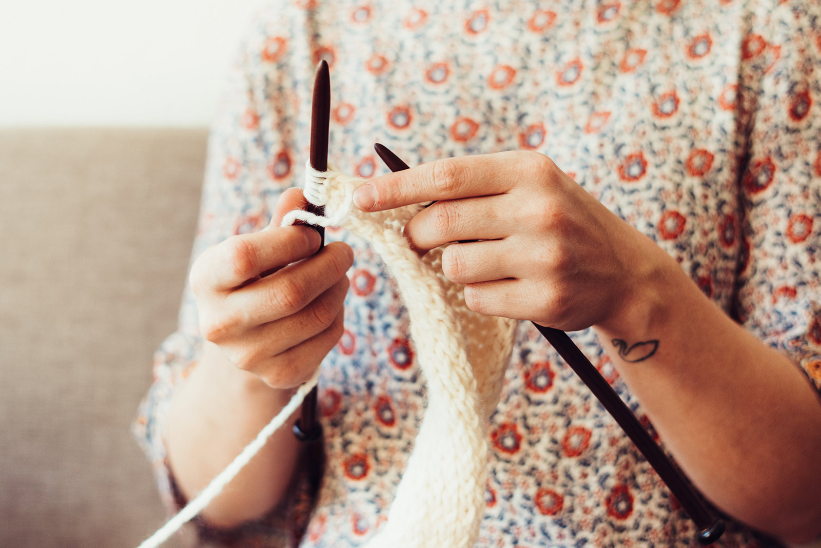 person holding crochet